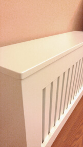 Radiator cover left top corner view shows the 0.5 inch overhang.