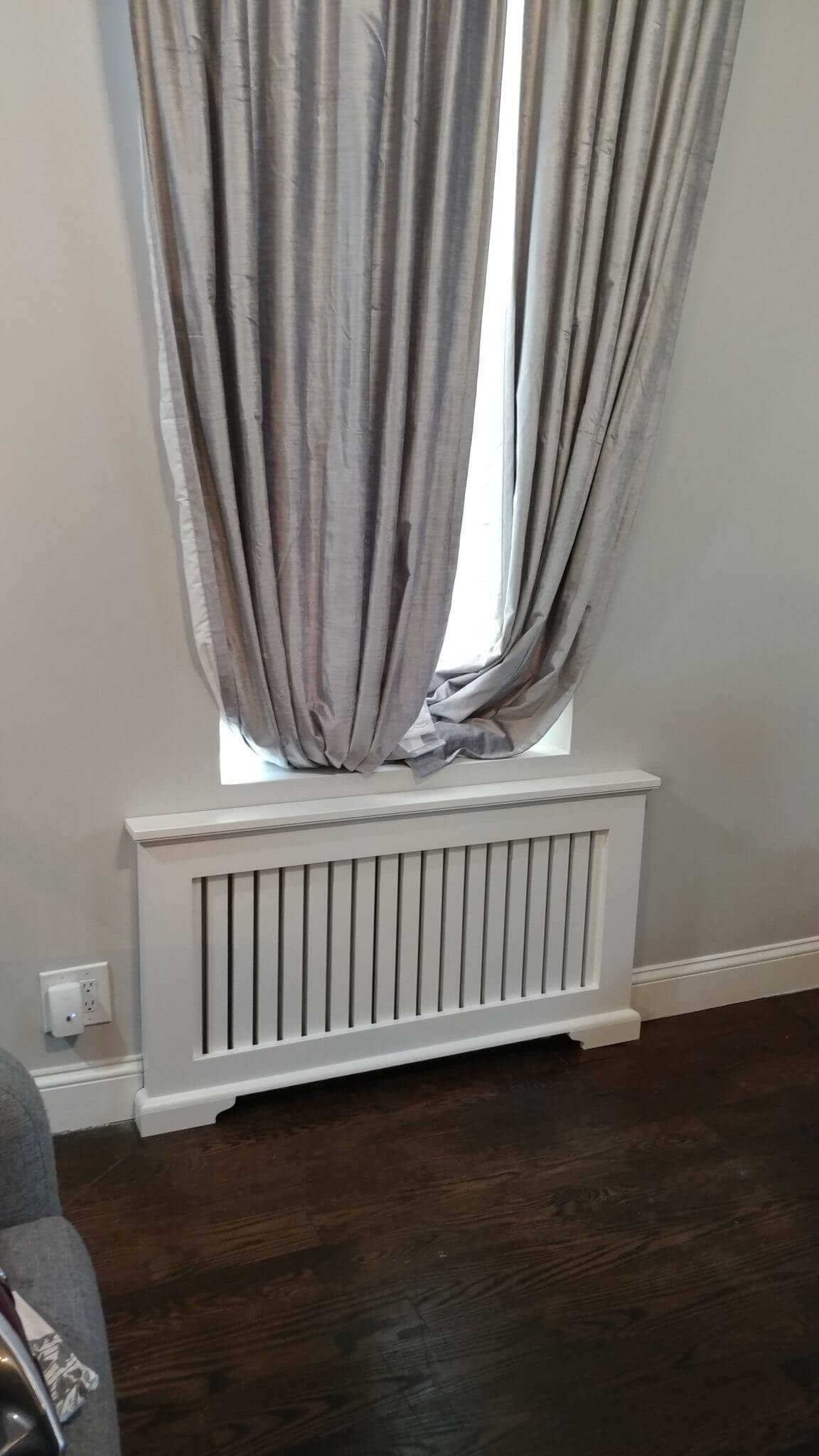 in-wall real wood radiator cover under window