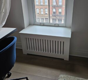 NYC Radiator Cover bench installed over the window sill.